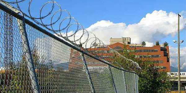 Chain Link Fence with Razor Wire