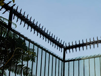 Residential gate with spikes for additional security